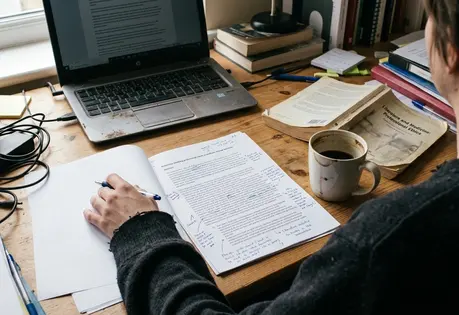 On-site Editorial desk with notes and drafts for the post Using Literature and Film